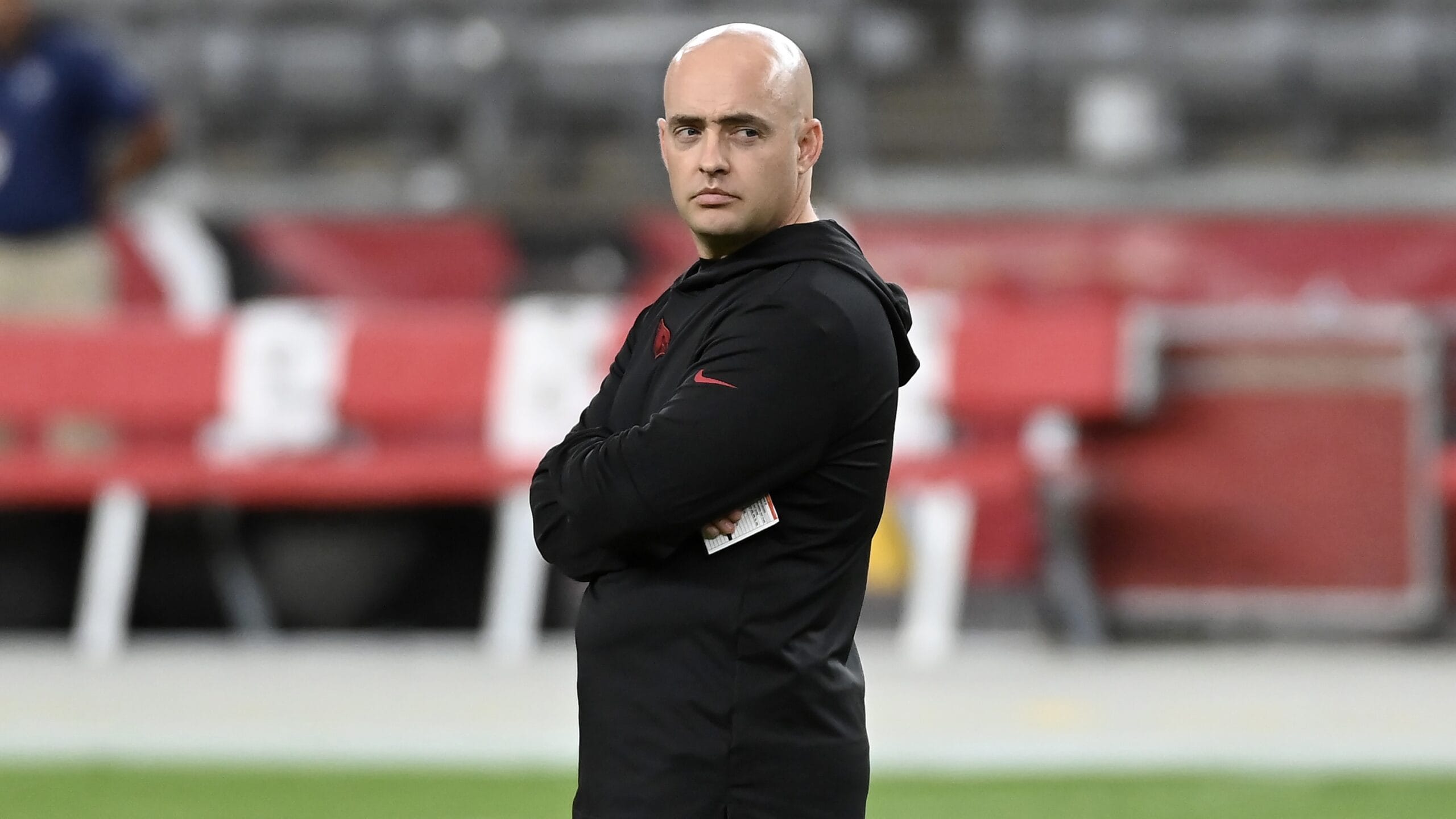 GLENDALE, ARIZONA - AUGUST 19: Offensive coordinator Drew Petzing of the Arizona Cardinals prepares for a preseason game against the Kansas City Chiefs at State Farm Stadium on August 19, 2023 in Glendale, Arizona. (Photo by Norm Hall/Getty Images)