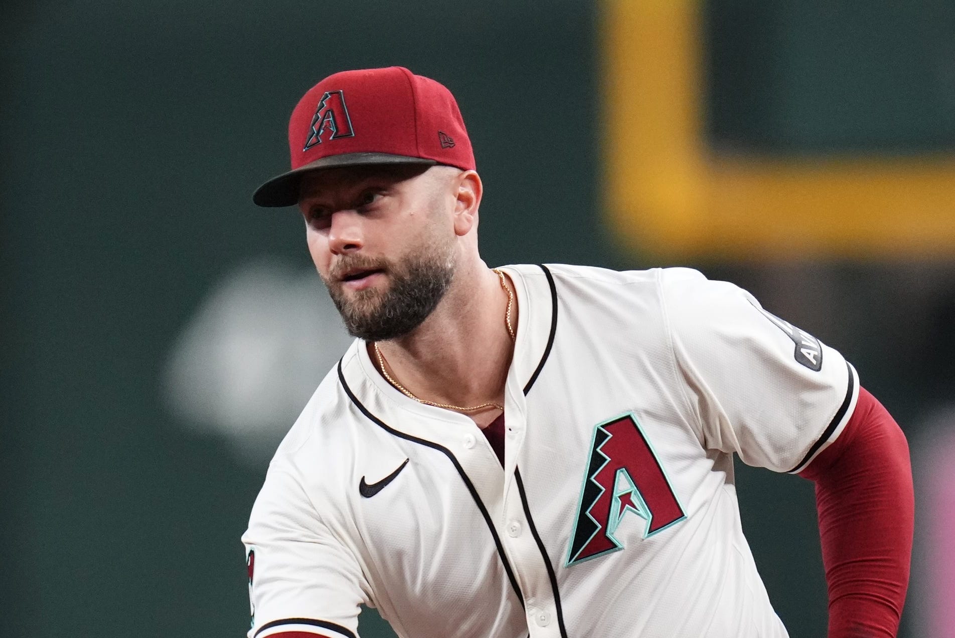 Diamondbacks infielder Christian Walker (53) tosses the ball to first base for the final out in their 11-2 win against the San Diego Padres at Chase Field on Sept. 29, 2024.