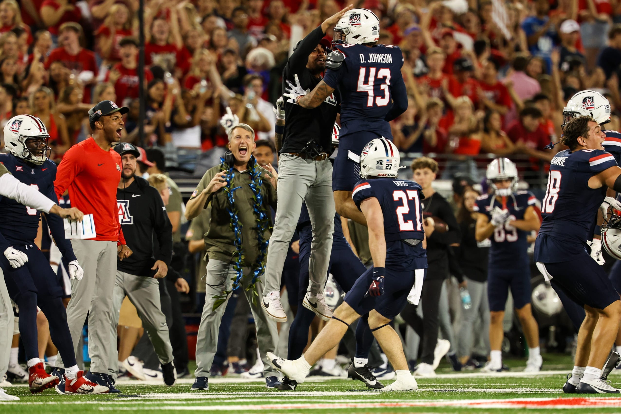 Arizona Wildcats defensive back Dalton Johnson (43) celebrates a turnover with the team during the third quarter. (Aryanna Frank-Imagn Images)