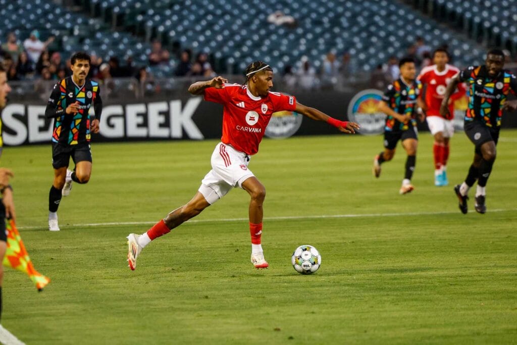 Jearl Margaritha dribbles the ball against Oakland Roots. Image: Oakland Roots